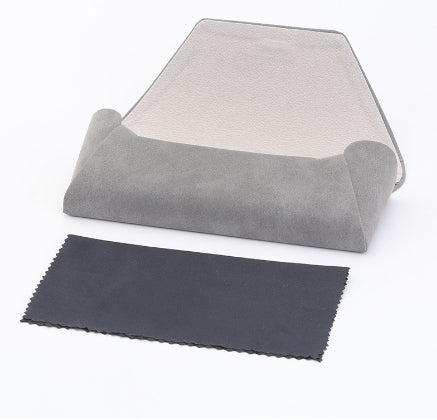 Open grey folding glasses case with a separate black cleaning cloth; sunglasses are not pictured