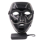 Black costume mask with a curved smile outline and wired controller, shown with the lights off.