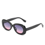 Black oval sunglasses with purple-gradient lenses on white.