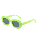 Bright green oval sunglasses with dark lenses on white.
