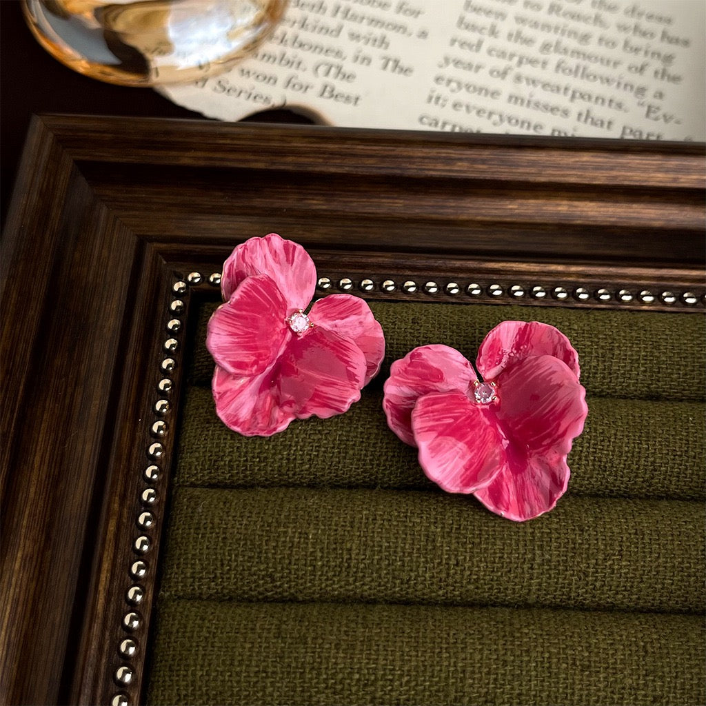 Style 4 pink flower earrings with small clear centres shown as a pair