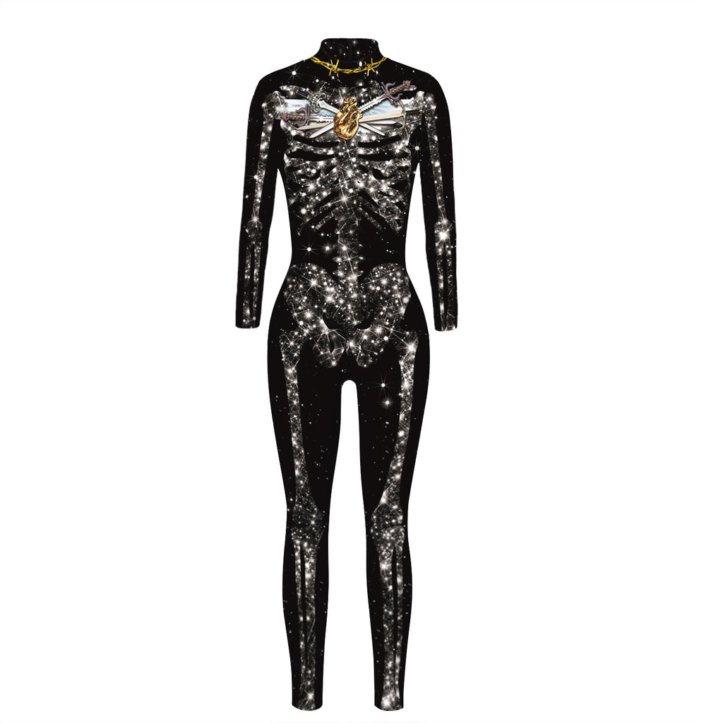 Black long-sleeve jumpsuit with a silver skeleton, star-like details and gold heart motif printed on the front, shown on a white background.