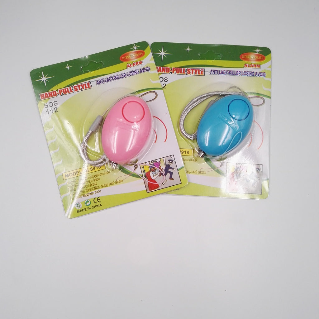 Pink and blue Personal Alarms shown in retail packaging; sold separately