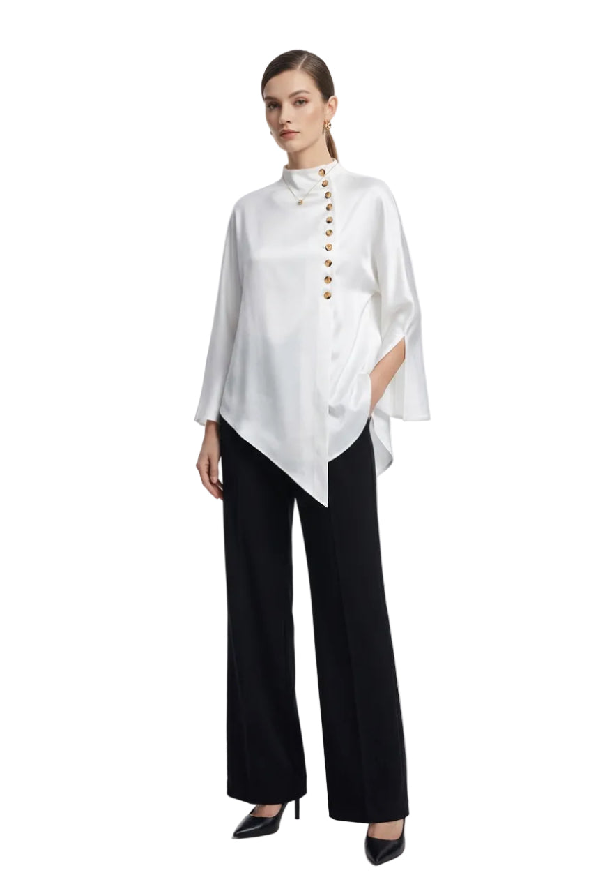Stand-collar shirt with asymmetric button placket, styled with black trousers.