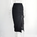 Black ruched midi skirt with a drawstring slit, shown on a transparent mannequin — front view