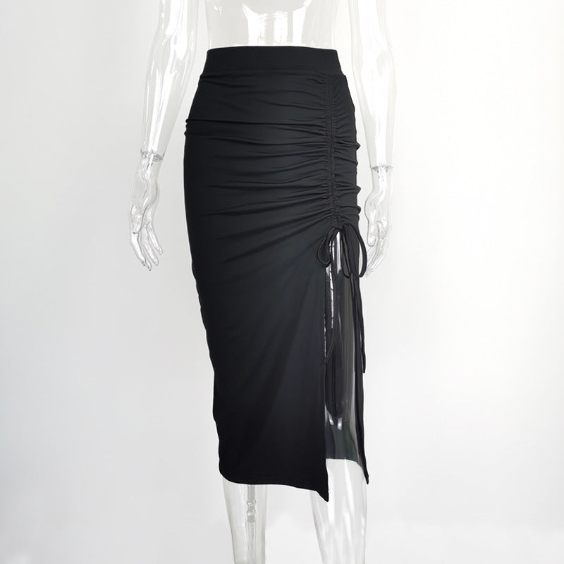 Black ruched midi skirt with a drawstring slit, shown on a transparent mannequin — front view