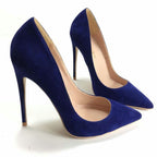 Blue pointed-toe pumps with slim stiletto heels and a low-cut opening.