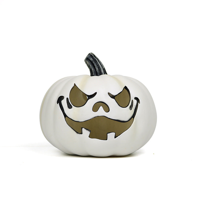 White pumpkin atmosphere light with a black outlined face