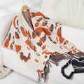 Leopard-Print Tassel Cape