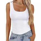 White ribbed sleeveless top with a square neckline, shown worn with blue jeans.