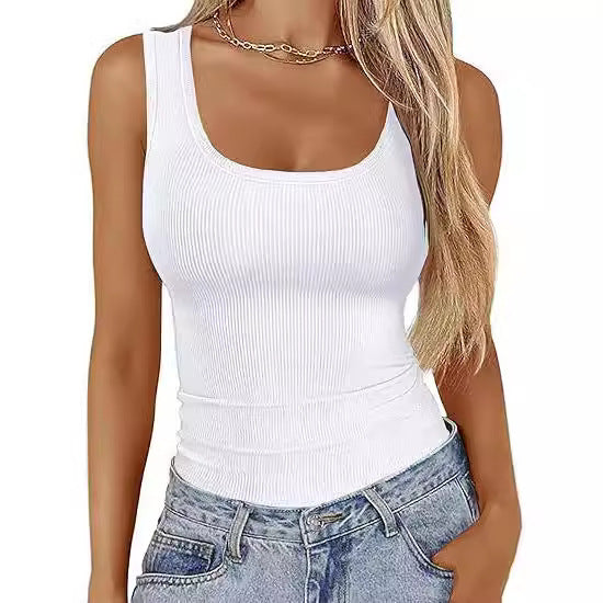 White ribbed sleeveless top with a square neckline, shown worn with blue jeans.