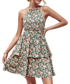 Green floral halter mini dress with a tiered ruffle skirt, shown worn against a white background.