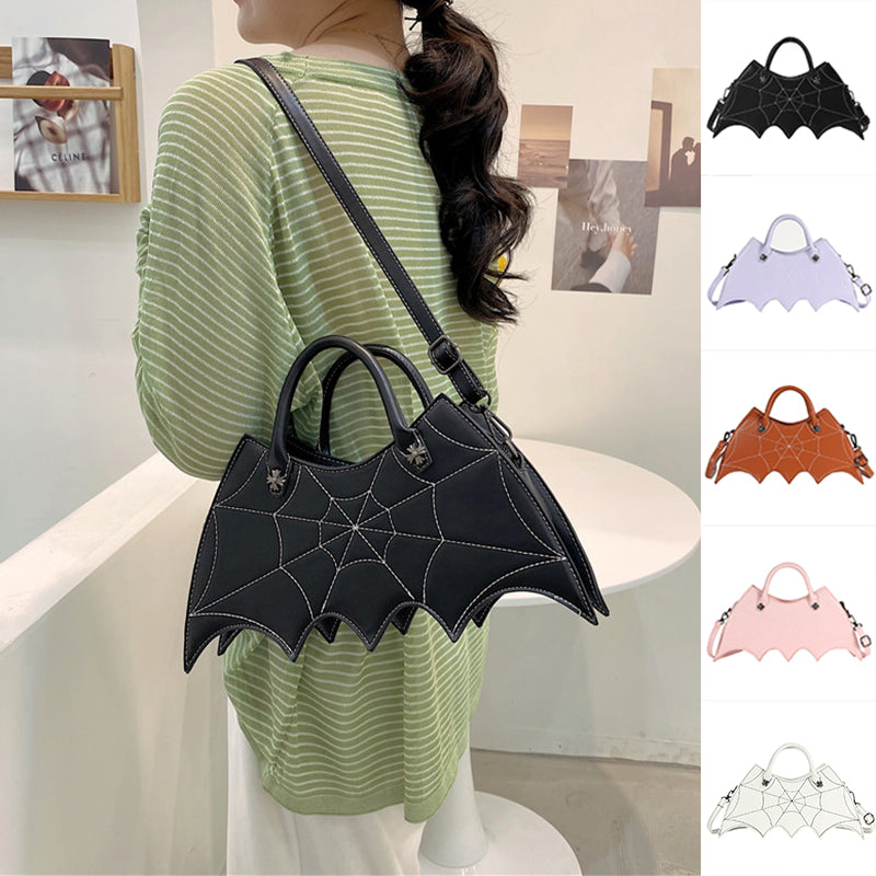 Black bat-wing-shaped bag worn over a green striped top, beside small images of five colour options.