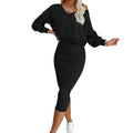 Black two-piece outfit with a long-sleeve top and matching sleeveless midi dress, shown worn.