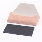 Open pink folding glasses case with a separate black cleaning cloth; sunglasses are not pictured