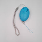 Blue Personal Alarm shown from the back with wrist strap