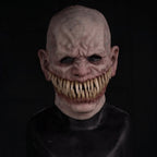 Grinning monster Halloween costume mask shown from the front.