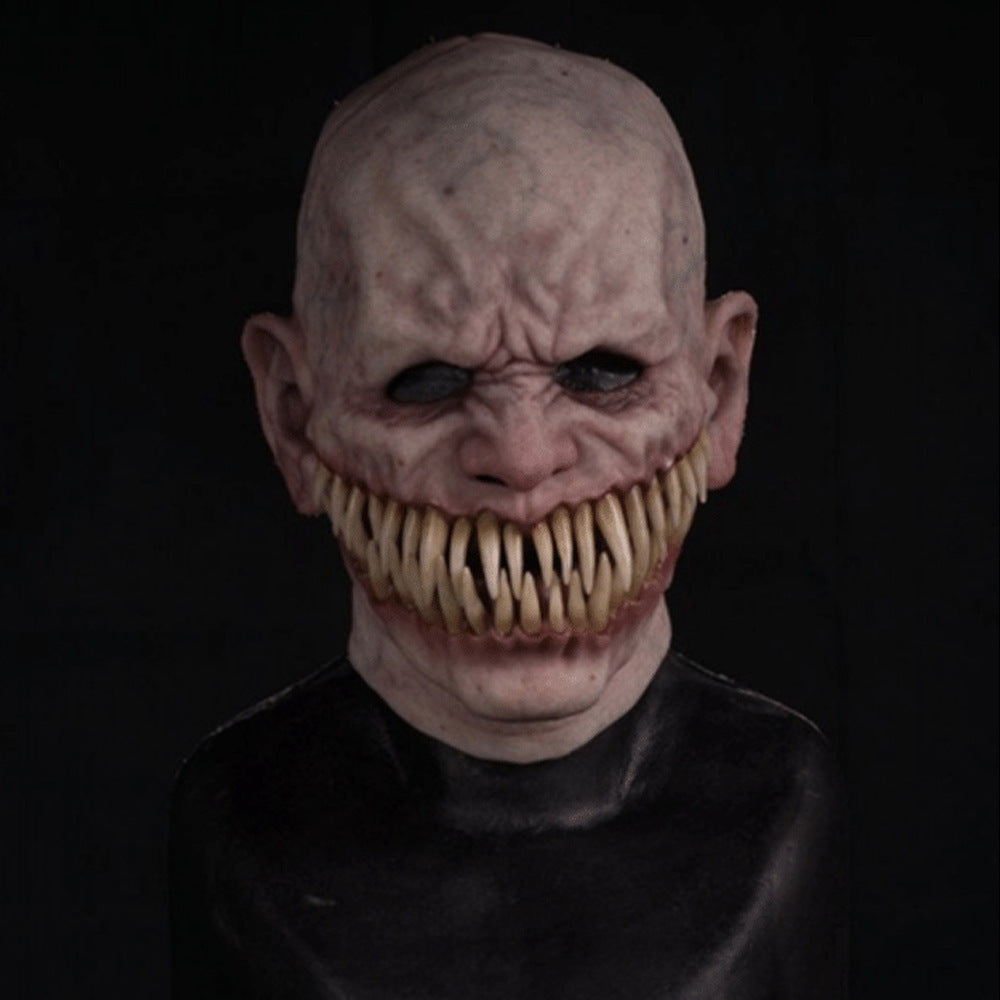 Grinning monster Halloween costume mask shown from the front.