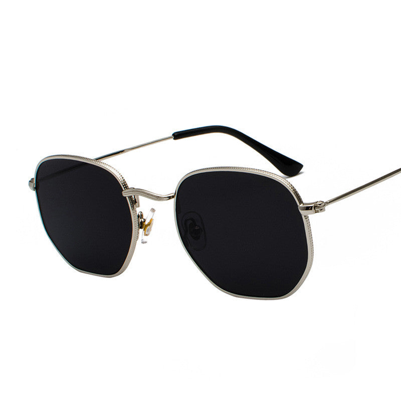Rounded-square glasses with silver-tone rims and dark lenses on a white background