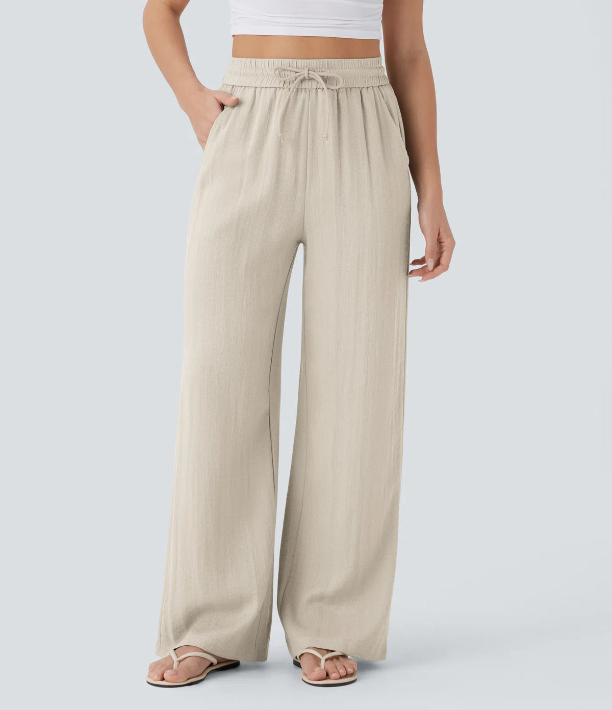 Apricot wide-leg trousers with drawstring waist and side pockets