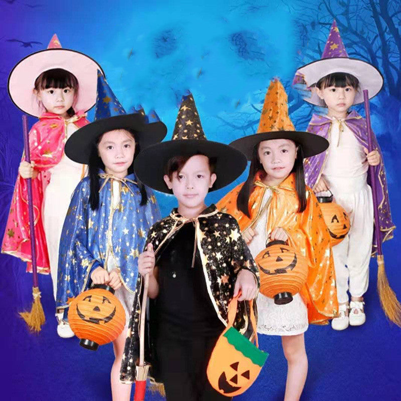 Children modelling star-patterned Halloween capes and pointed hats in several colours, with broom and pumpkin-bag display props.