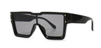 Black oversized square shield sunglasses on a white studio background