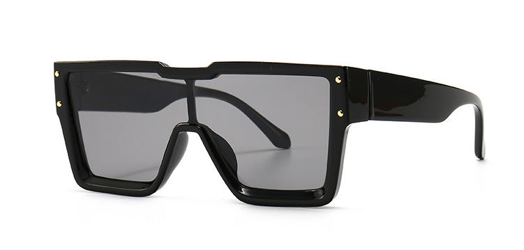 Black oversized square shield sunglasses on a white studio background