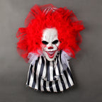 Red clown Halloween wreath with black-and-white striped ribbons.