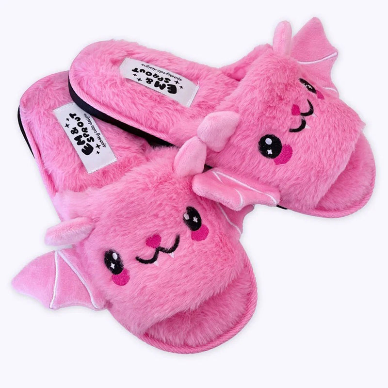 One pair of pink Bat-Wing Slippers with embroidered faces.