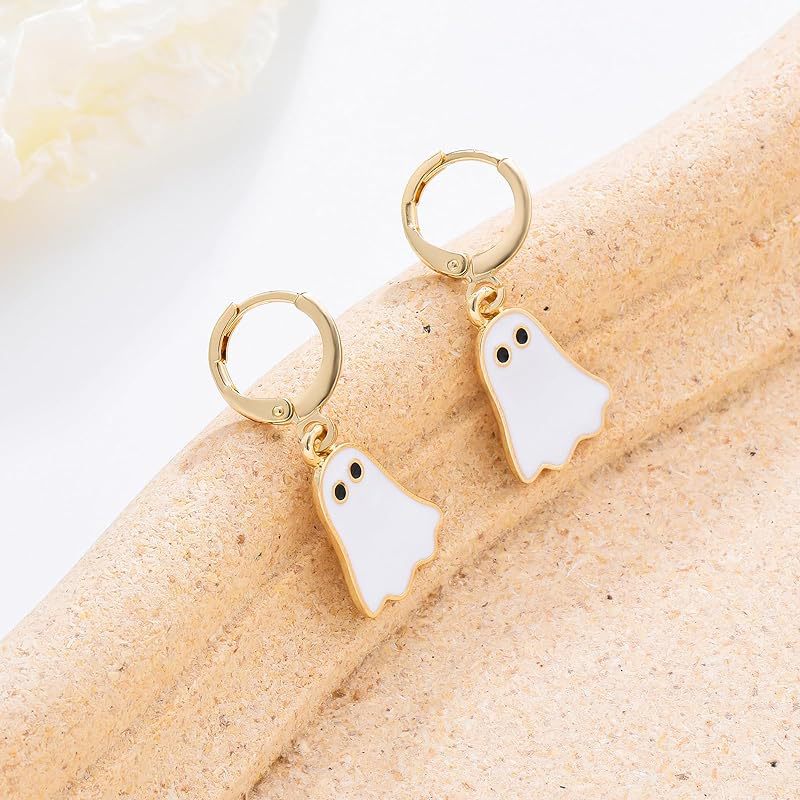 Pair of gold-tone hoop earrings with white ghost charms and black eyes