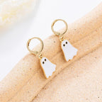 Pair of gold-tone hoop earrings with white ghost charms and black eyes