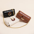 Chain Detail Shoulder Bag shown in black, beige and brown; sold separately