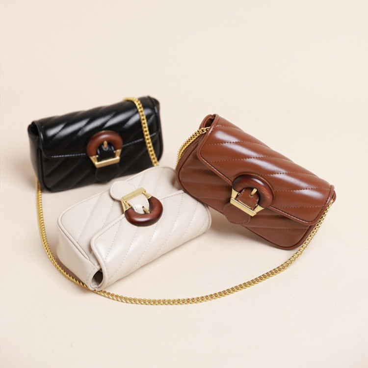 Chain Detail Shoulder Bag shown in black, beige and brown; sold separately