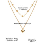 Double-layer heart necklace diagram with supplier measurements and material information.