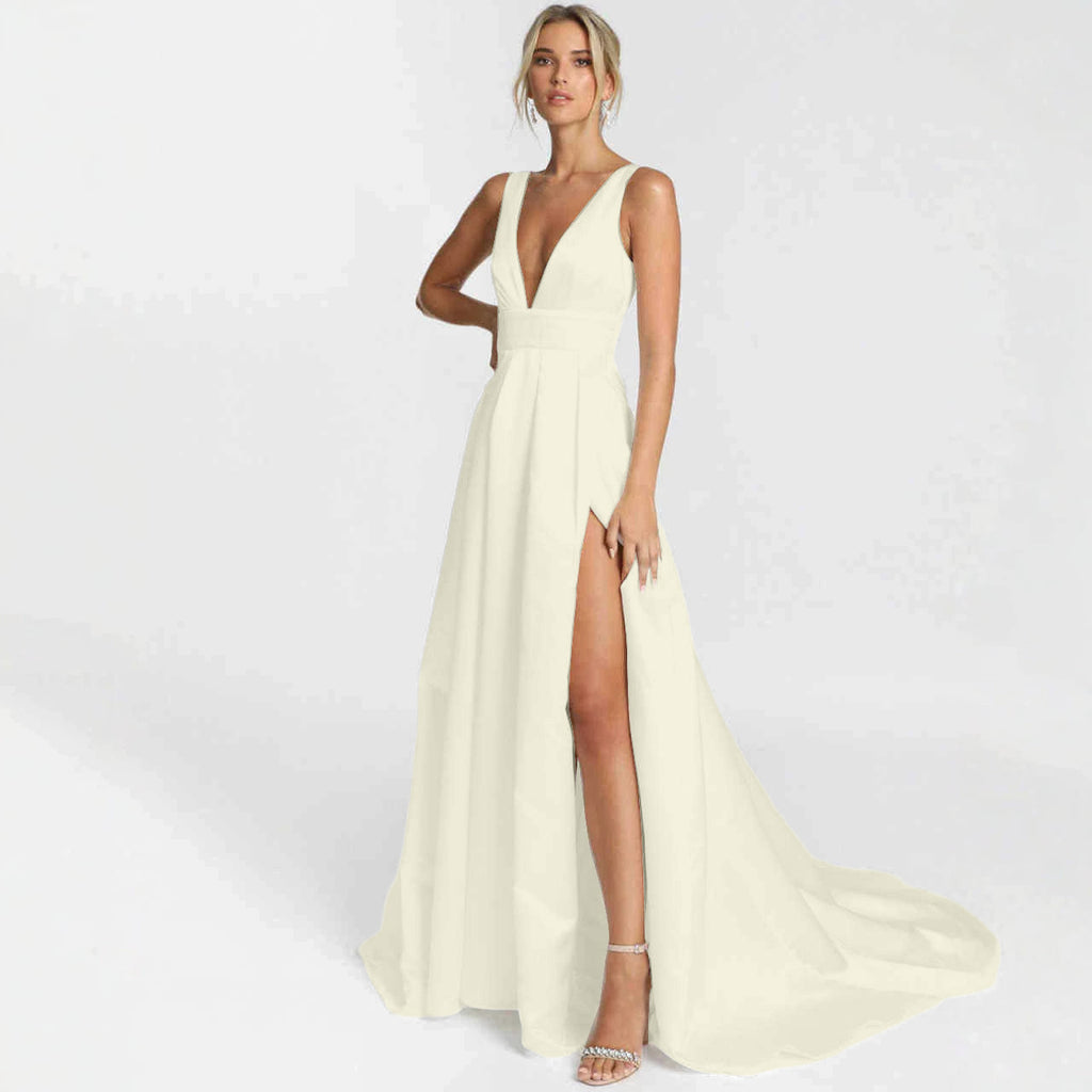 Ivory White sleeveless V-neck bridal maxi dress with thigh slit and train shown worn