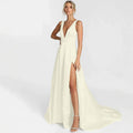 Ivory White sleeveless V-neck bridal maxi dress with thigh slit and train shown worn