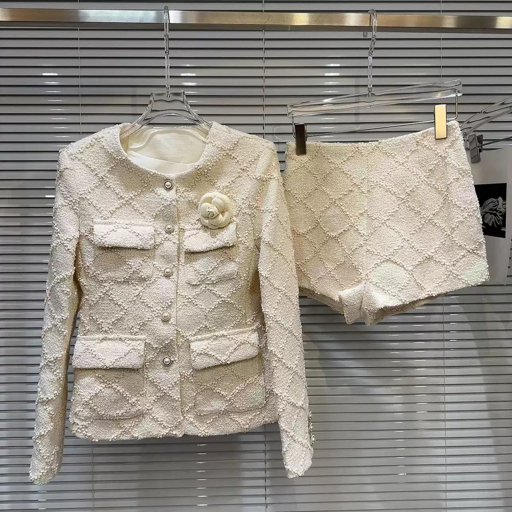 Beige patterned blazer and matching shorts shown as one set