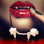 Retractable vampire-fang denture with an example of the worn effect