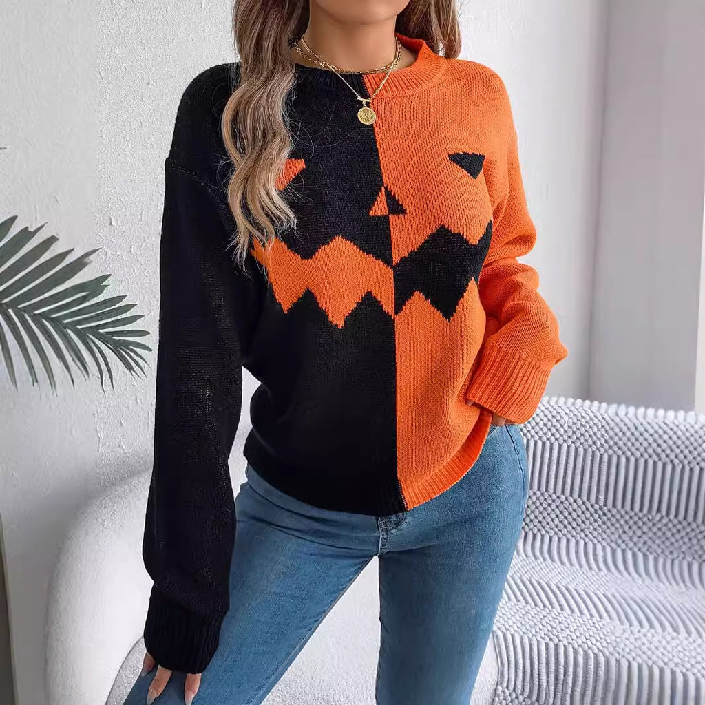 Orange-and-black jack-o'-lantern knit sweater worn on a model.