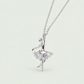 Ballerina Pendant Necklace on a pale sage background