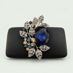 Geometric Statement Brooch in Blue on its display support against pale sage