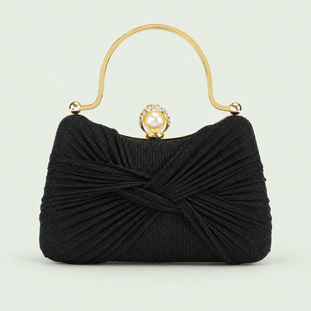 Pleated Shimmer Evening Bag in Black on a pale sage background