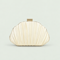 Shell-Shape Pleated Bag in Apricot on a pale sage background