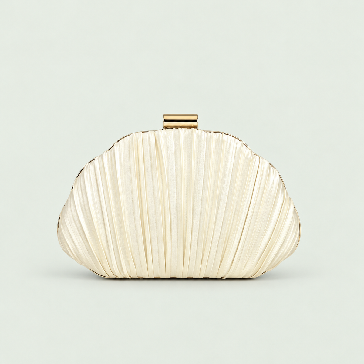 Shell-Shape Pleated Bag in Apricot on a pale sage background